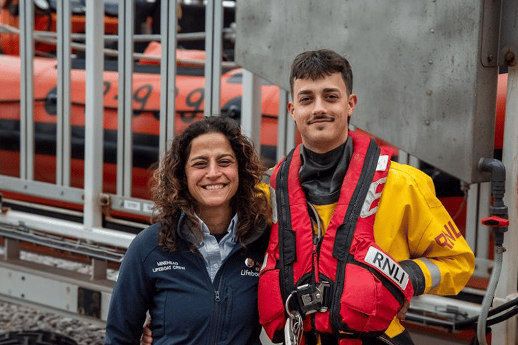 Minehead Lifeboat helm Raji Webber and her son Harrison.