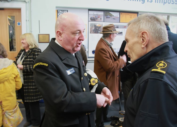 Coastguard Simon Bale (left) chats with National Coastwatch Institute Minehead station manager David Curran.