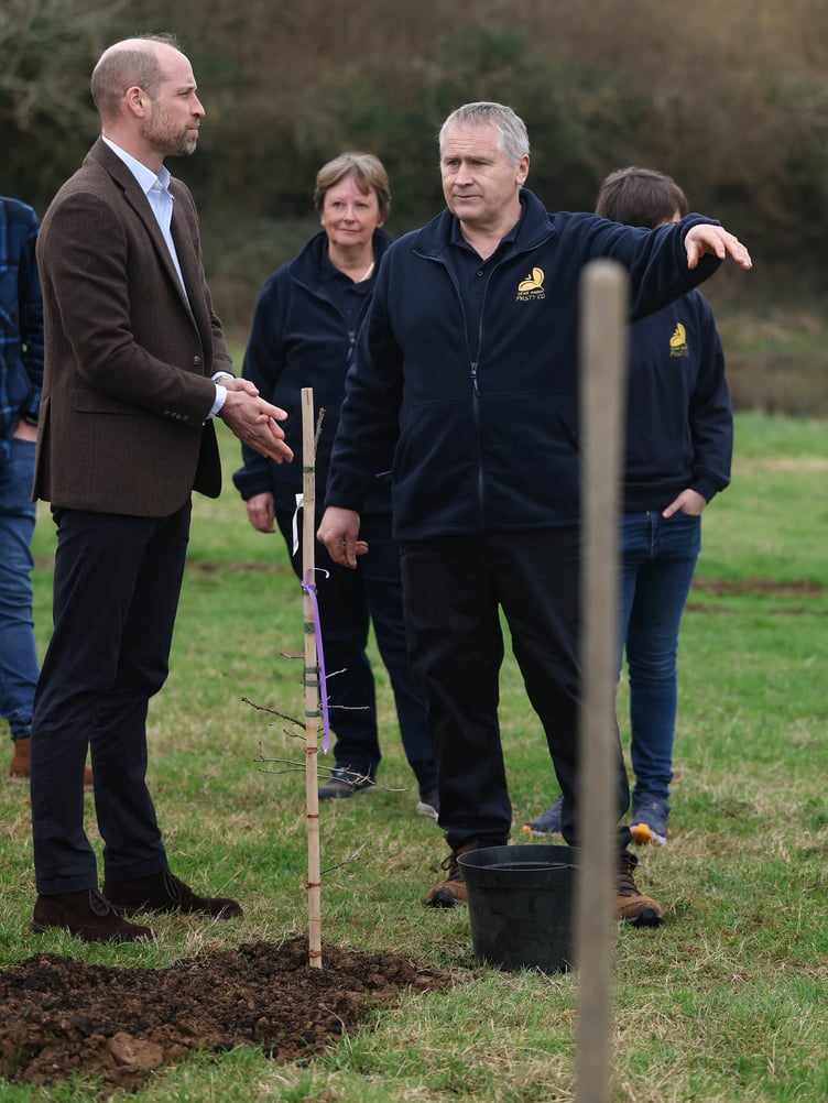 The Duke of Cornwall plants a tree at Gear Farm (Picture: Andrew Parsons / Kensington Palace)