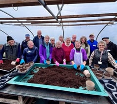 Volunteers dig in to help Farnham in Bloom preparations