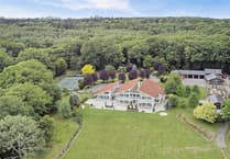 Sustainable woodland mansion with helipad hits market for £4m