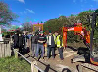 Mayor gets hardcore as neighbours repair Farnham road