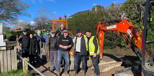 Mayor gets hardcore as neighbours repair Farnham road