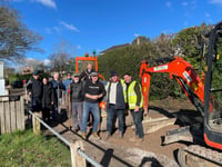 Mayor gets hardcore as neighbours repair Farnham road