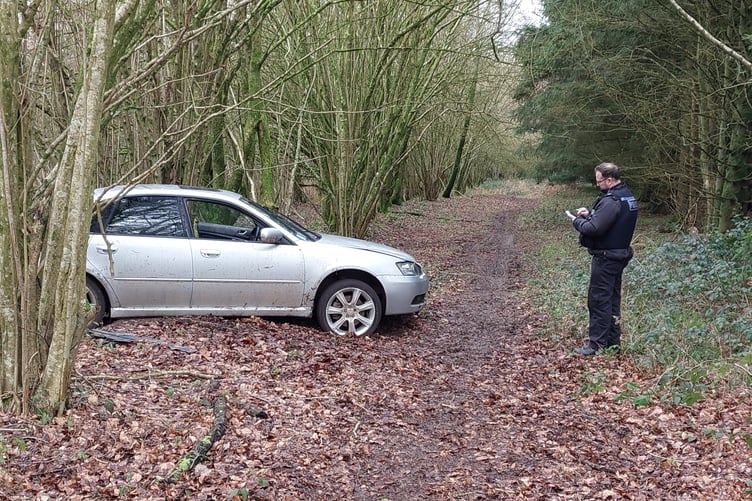 A Subaru car which was left abandoned after suspected hare coursing.