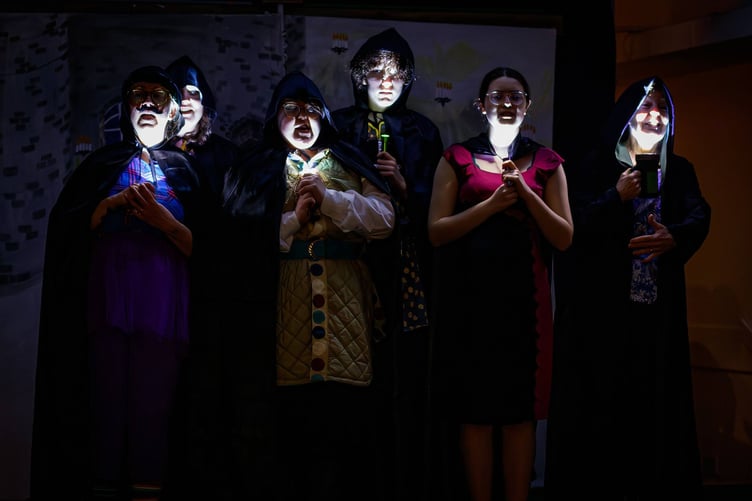 The cast performs its rendition of the iconic Bohemian Rhapsody video (Picture: Bodmin and District Camera Club)