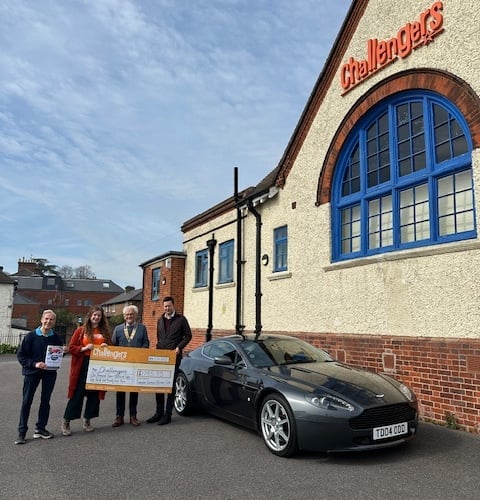 Challengers receives a cheque from Farnham Weyside Rotary Club, March 20th 2026.