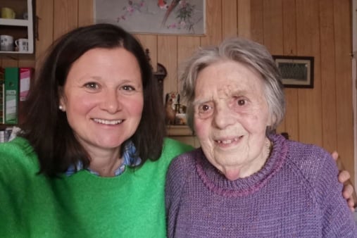 A befriending volunteer with her friend.