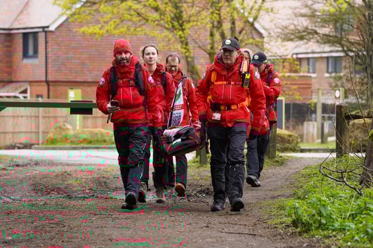 Surrey Search & Rescue volunteers prepare to set off from the Devil’s Punch Bowl as part of a 100-mile endurance relay. (Credit: Surrey Search & Rescue)