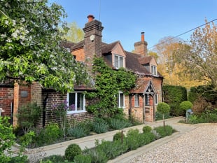 "Idyllic" Frensham home for sale with landscaped riverside gardens 