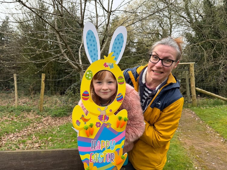 Evie (left) and Nicole (right) stopped for a picture in the Easter stand