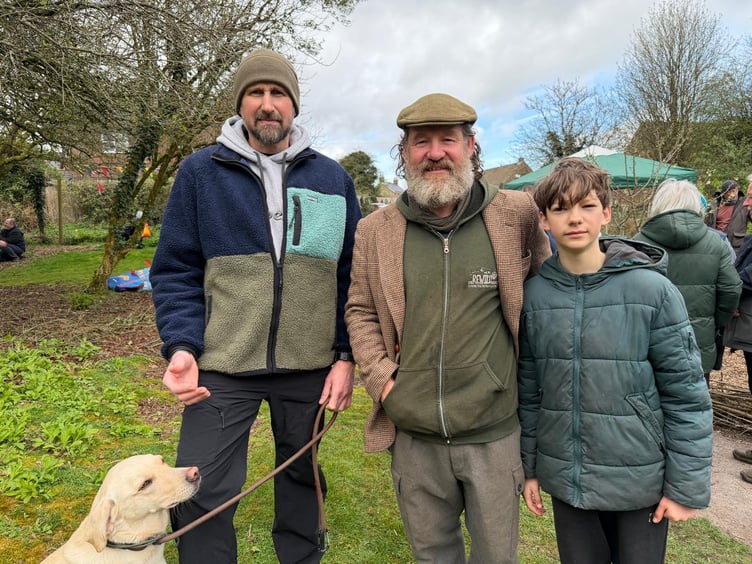 Julian with his dog, and Scott who helped inform planners for the orchard ten years ago