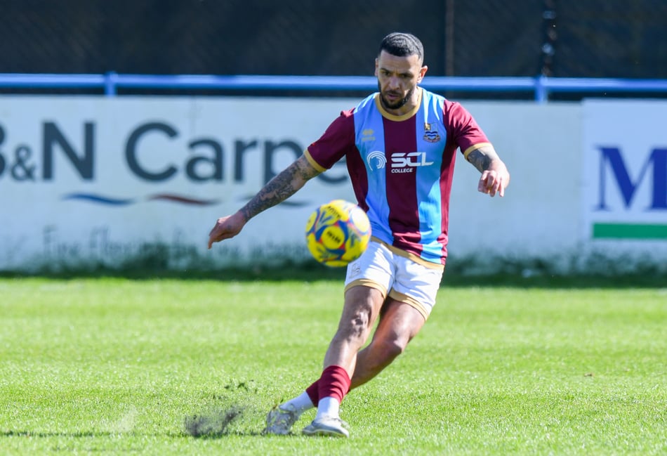 <p>Billy Clifford looks to get Farnham Town on the front foot against Bracknell</p>