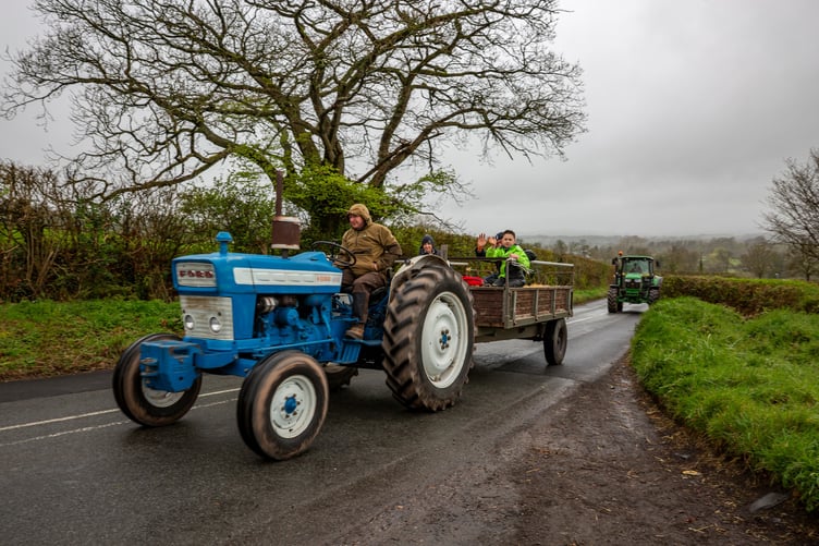 Riding in style during the vintage tractor parade