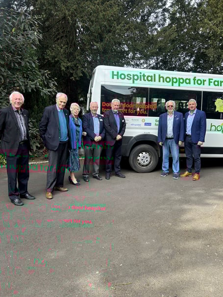 Members of Farnham Rotary Club with Richard Davies from hoppa (right)
