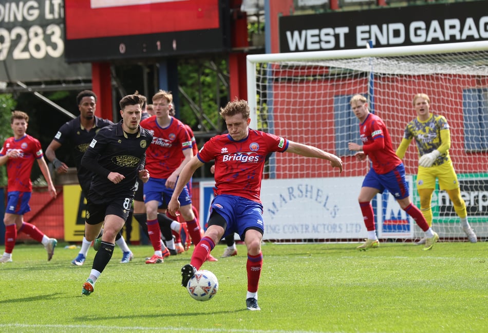 <p>Cameron Hargreaves recycles an Aldershot Town attack (Photo: Ian Morsman)</p>