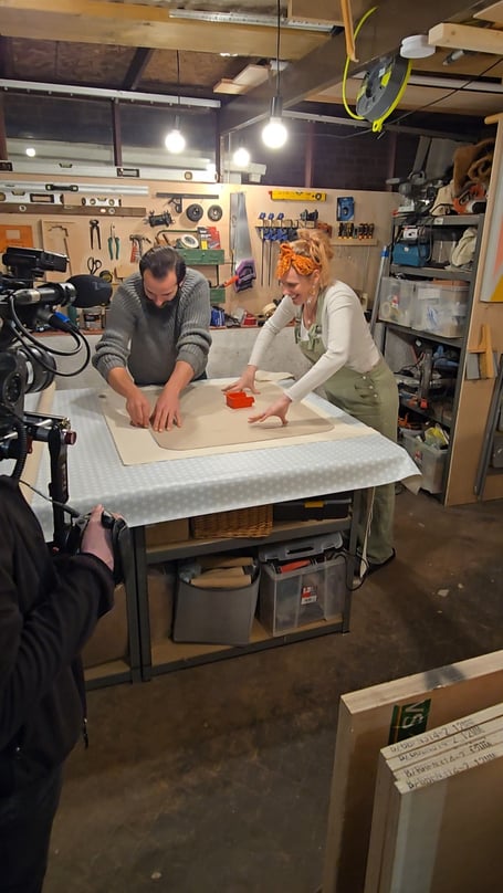 Dominic Chinea and Hayley Poulter while filming the BBC series I Made It at Market.