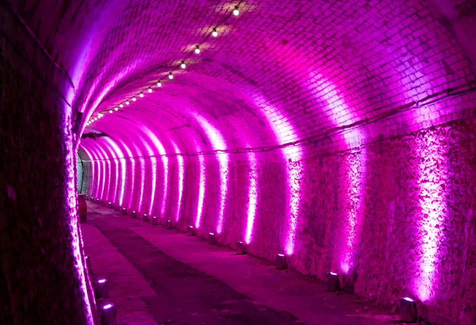 <p>Inside the 120-metre 19th-century tunnel beneath Horsley Towers in East Horsley, recently reopened after 50 years as part of the De Vere Horsley Estate refurbishment. Courtesy of De Vere Horsley Estate</p>