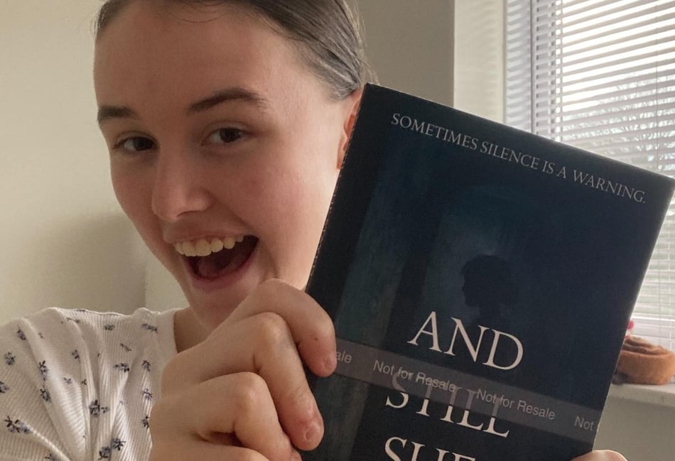 <p>Liss resident Chloe Ramsay with her book And Still She Stayed.</p>