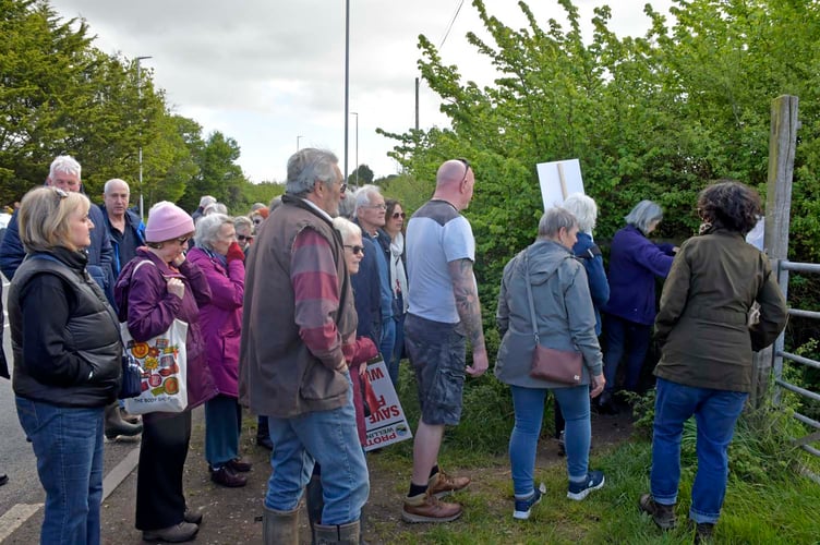 Protesters pour onto fields to the south of Wellington Relief Road to show their opposition to housing plans. PHOTO: Alain Lockyer.