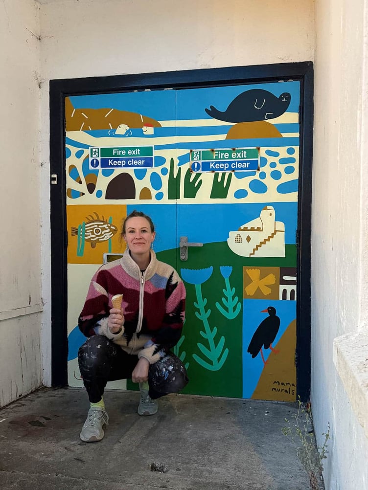 A Patchwork of Newquay by Emily Marlowe. A joyful Newquay patchwork of coast, wildlife, Huer's Hut, seals, swimmers and wildflowers — designed to uplift and evoke a sense of place