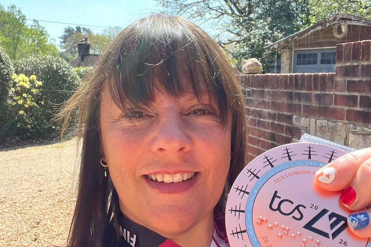 Jo Kent from Rake with her London Marathon Medal