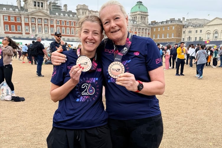 Gemma Reeder and Karen Sinclair celebrate completing the London Marathon