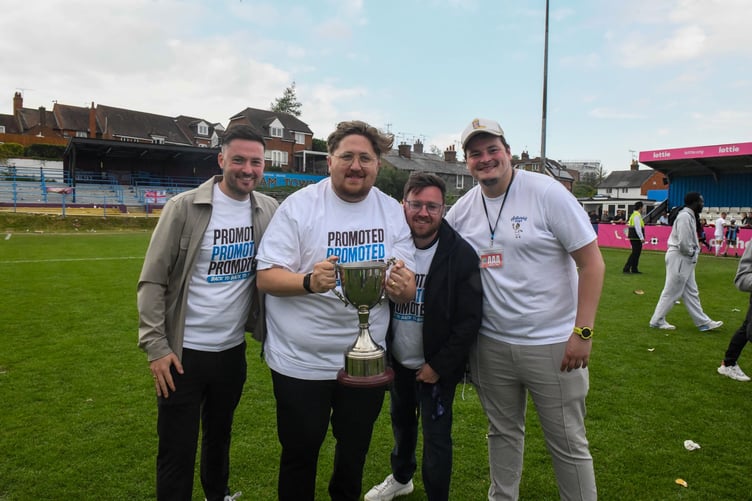 LEFT TO RIGHT: Farnham Town club development liaison Tom Bore, secretary Frankie Hobbs, chairman Harry Hugo and media officer Michael Oliver celebrate promotion