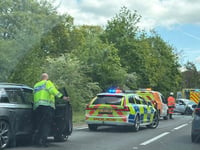 Delays on A31 Hogs Back after car and motorcycle collision
