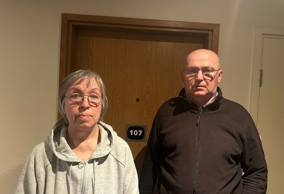 <p>Valerii and Nataliia Safronova outside their emergency accommodation. </p>