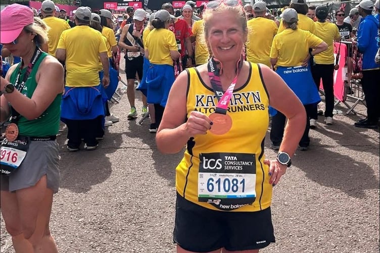 Kathryn Powell shows off her London Marathon medal