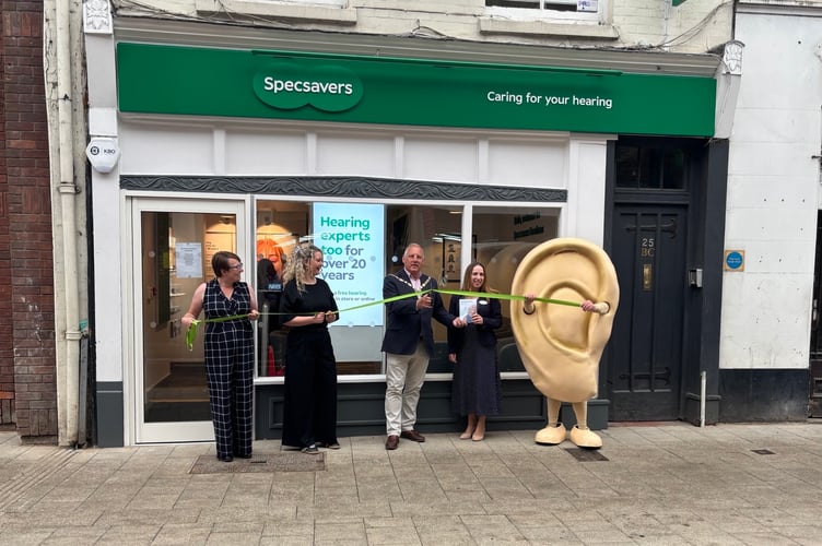 Farnham Town Mayor George Murray opens the Specsavers Hearcare Centre in Farnham.