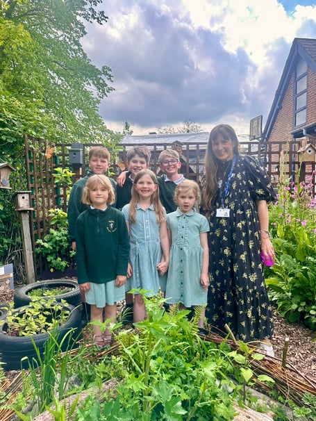 Teacher Emma Jones and pupils in The Attenborough Garden at Bentley CE Primary School, May 8th 2026.