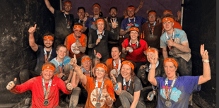 Muddy runners from Eggar's School raise £2,500 for charities