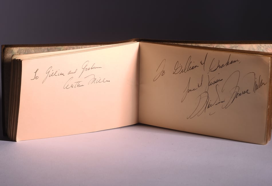 <p>The book with the autographs and dedications from Arthur Miller, left, and Marilyn Monroe, right.</p>