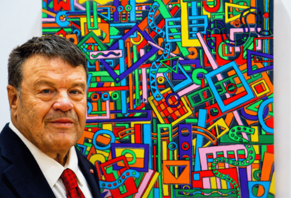 <p>Tom Yendell with one of the paintings he submitted for the Association of Mouth and Foot Painting Artists' 70th birthday exhibition.</p>