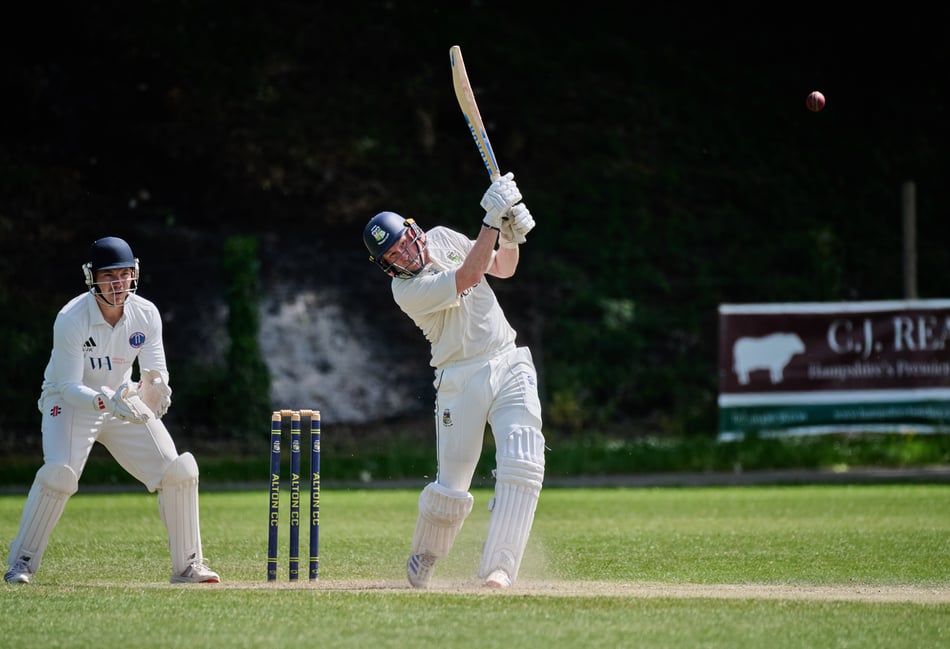 <p>Alton batter Michael Heffernan hits out on his way to 90 against Hartley Wintney (Photo: Howard Gadsby)</p>