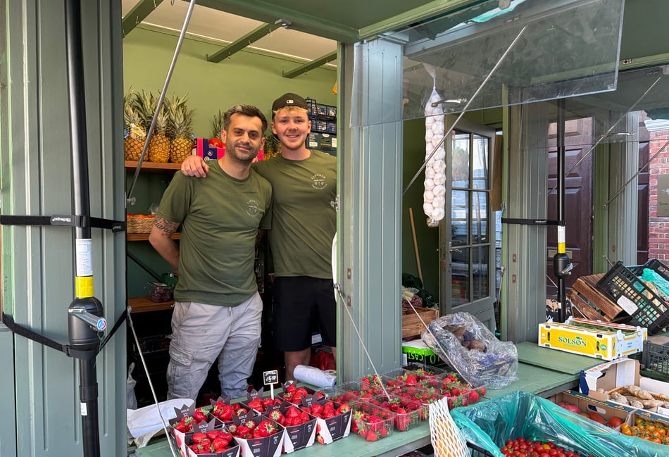 <p>Florian Ramizi has opened Farnham Greengrocer on Castle Street with his partner, Ellen Ashby. He is seen here with Ellen's brother, William.</p>