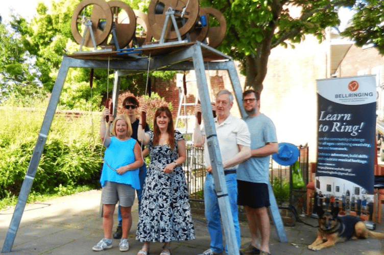 St Peter's Church Bell Ringers set up the mini ring for the Petersfield Festivities. From left: Rebecca Restall, Francesco Greenslade, Rachael Barber, Brian Underwood, Nick Halder and Sasha the dog, May 25th 2026.