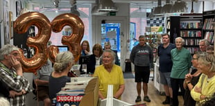 Volunteer honoured for years of service at Oxfam shop