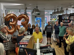 Volunteer honoured for years of service at Oxfam shop