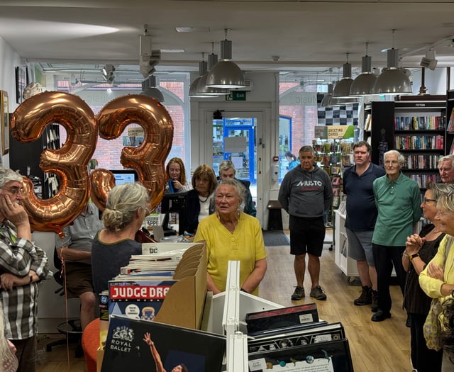 Volunteer honoured for years of service at Oxfam shop