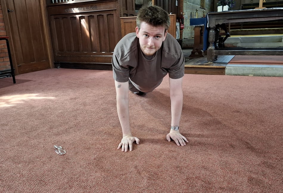 <p>Robbie Eggleton trying out a press up.</p>