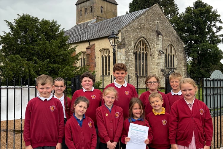 The Collective Worship Crusaders at St Lawrence CE Primary School in Alton celebrate its Statutory Inspection of Anglican and Methodist Schools report from the Church of England, June 8th 2026.