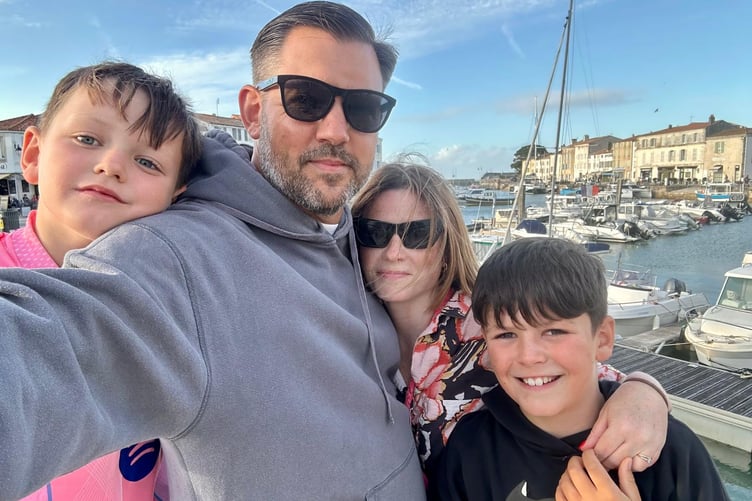 Sarah Goldup of Farnham with her husband Lee and two sons, Lucien, 10, and Rafferty, 7.