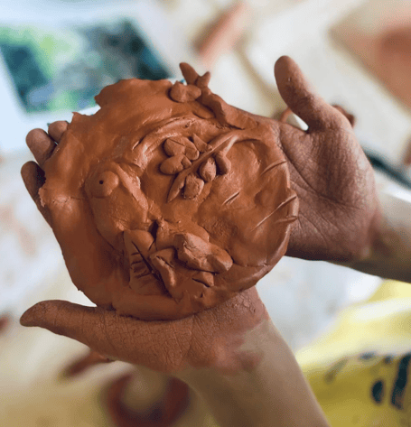 Clay relief tile.