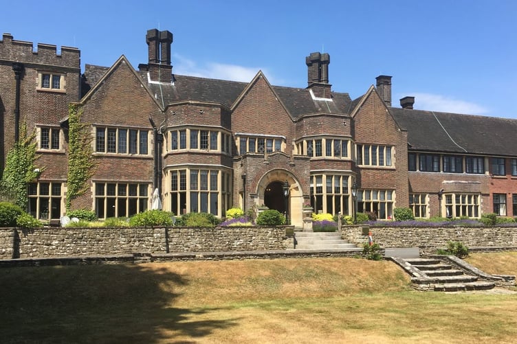 Oak Hall at the former Wispers site in Haslemere. Plans have been submitted to build nine homes on the nearby former tennis courts and car park.