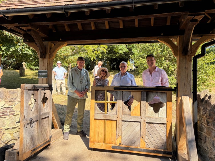 Mayor Graham White, Mayoress Mrs White, Gerald Blues and Danny the carpenter at Wrecclesham lychgate.