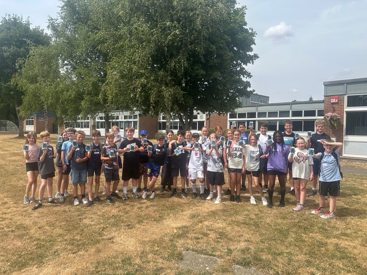 Soon to be Year 7 children attending Eggar's School's summer camp were the first to be given one of 40 brick phones paid for by a council grant, July 23rd 2026.