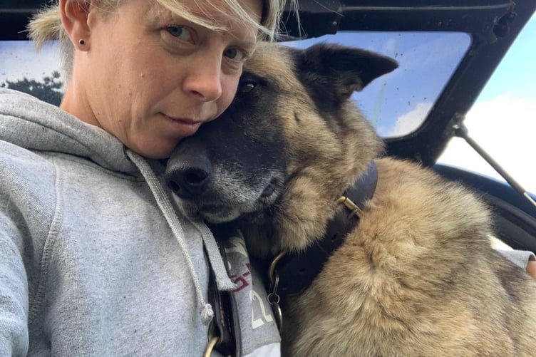 Surrey police dog Polly and her owner Claire.